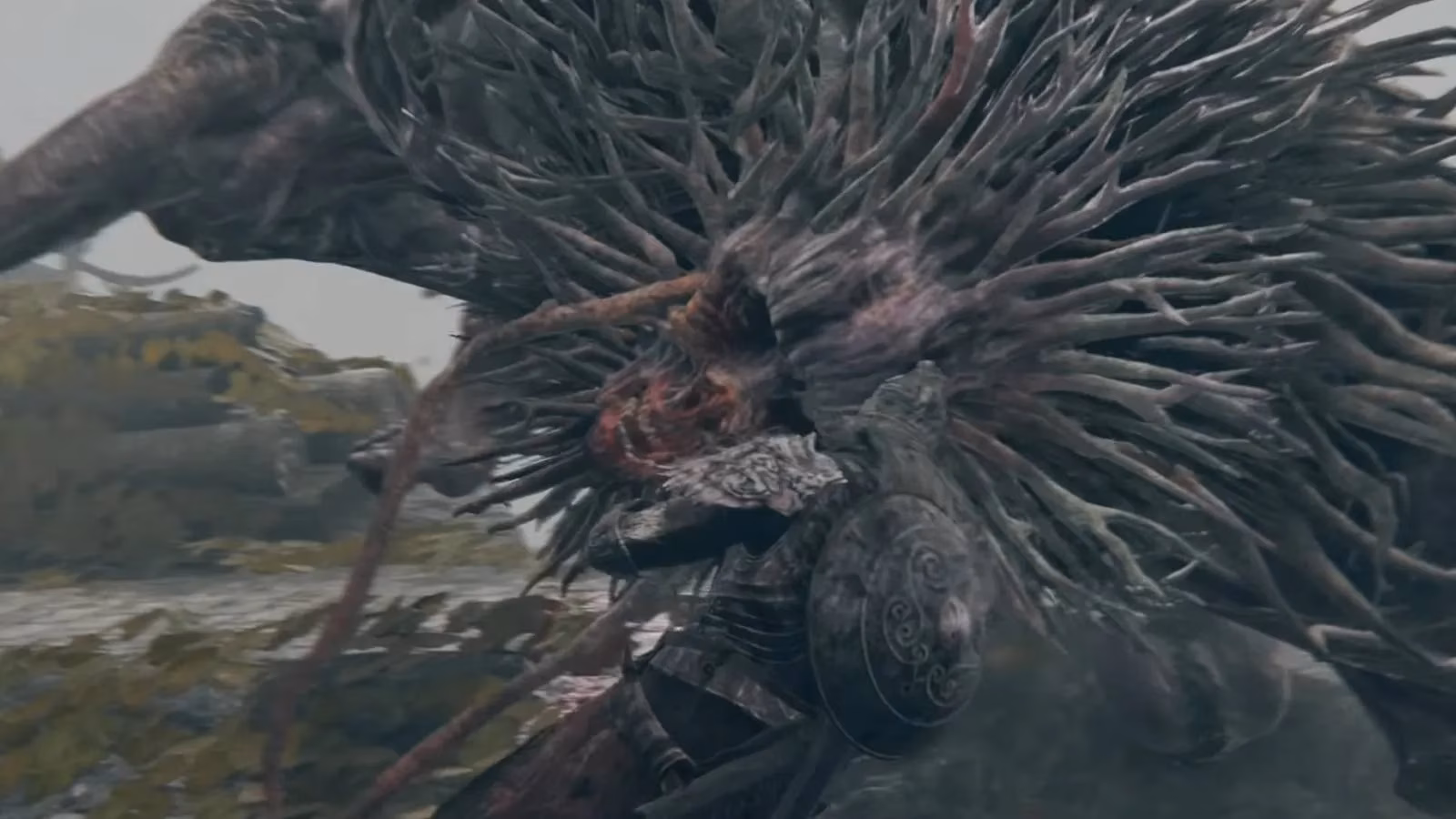 why-elden-ring-trolls-have-that-horrifying-hole-in-their-stomach-image-0